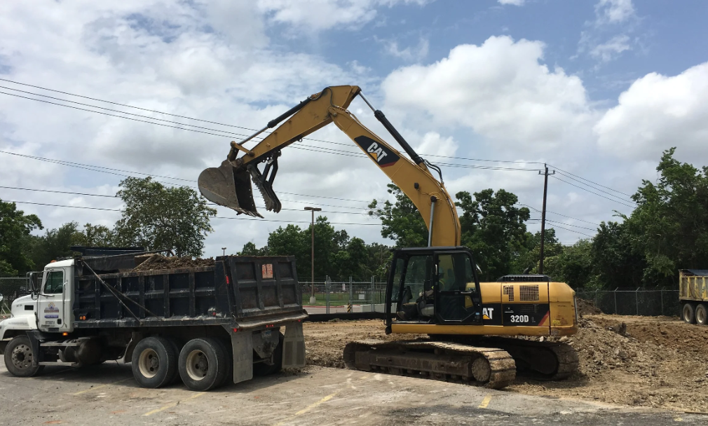 Utility trench excavation and soil removal — industrial project (2)